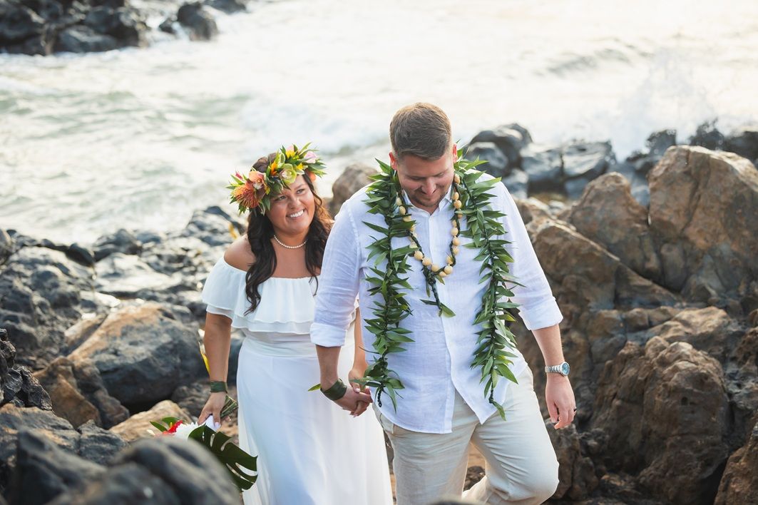 Maui wedding photographer photo against beautiful Maui sunset beach by ohwowfotos.