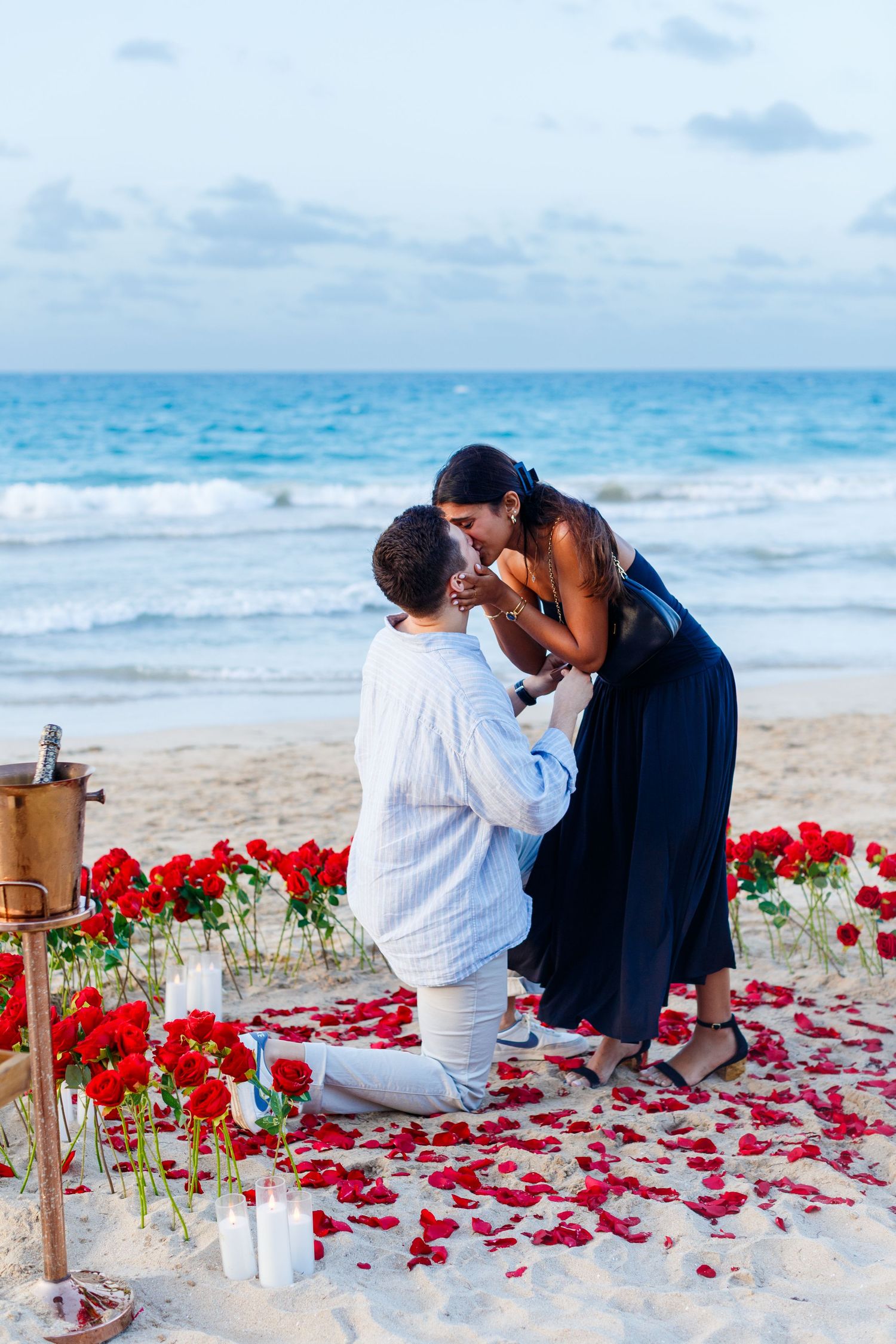 Couples portrait. Marriage proposal on the beach in Isla Verde, Carolina, Puerto Rico.