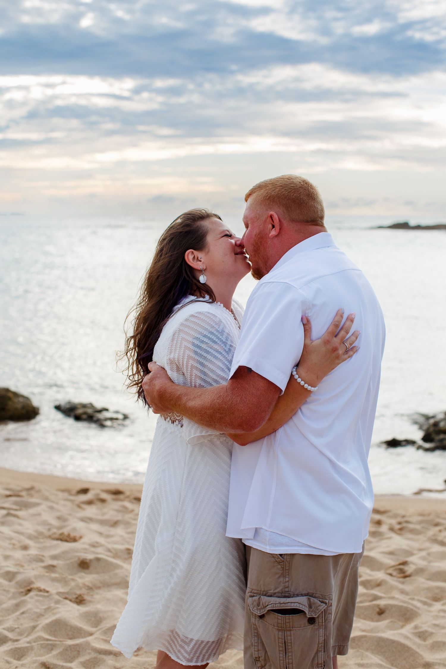 Elopement on the beach at Balneario del Escambrón in Old San Juan, Puerto Rico. Wedding ceremony. Bride and groom.