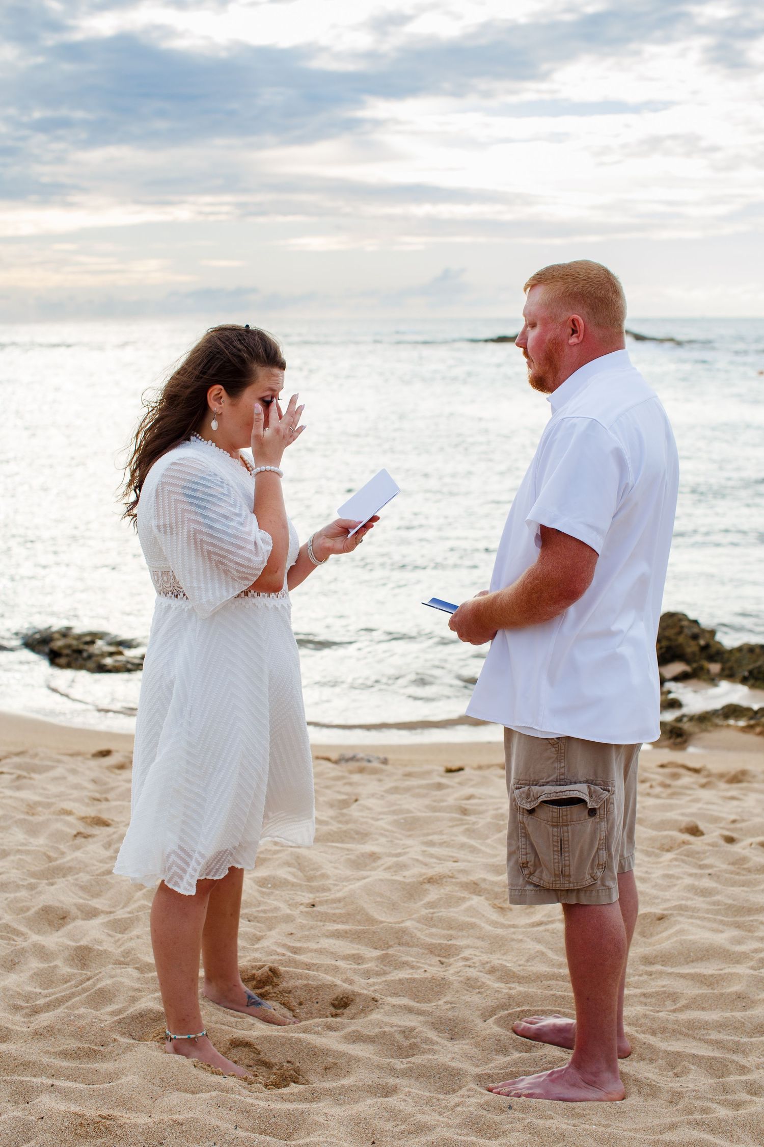 Elopement on the beach at Balneario del Escambrón in Old San Juan, Puerto Rico. Wedding ceremony. Bride and groom.