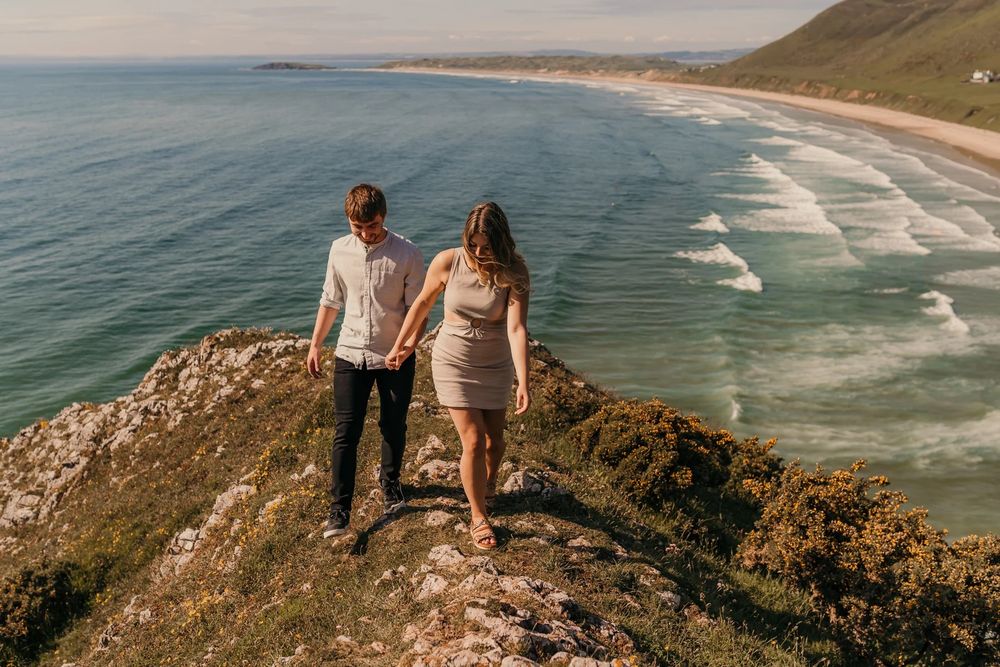 A series of ocean views featuring a couple enjoying scenic coastal cliffs and beach landscapes at sunset.