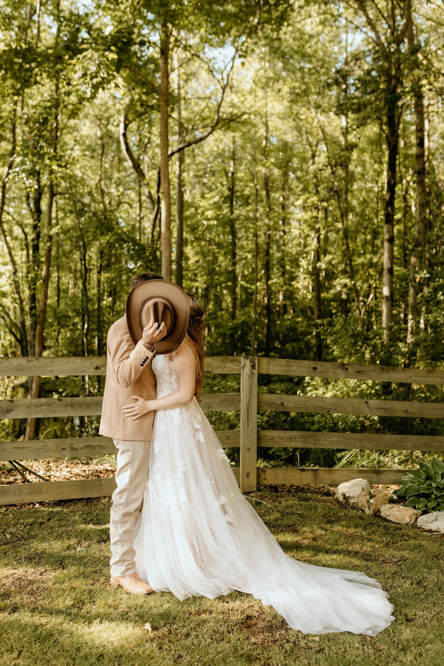 Photograph of bride and groom at the barn at big oak in franklin Georgia
