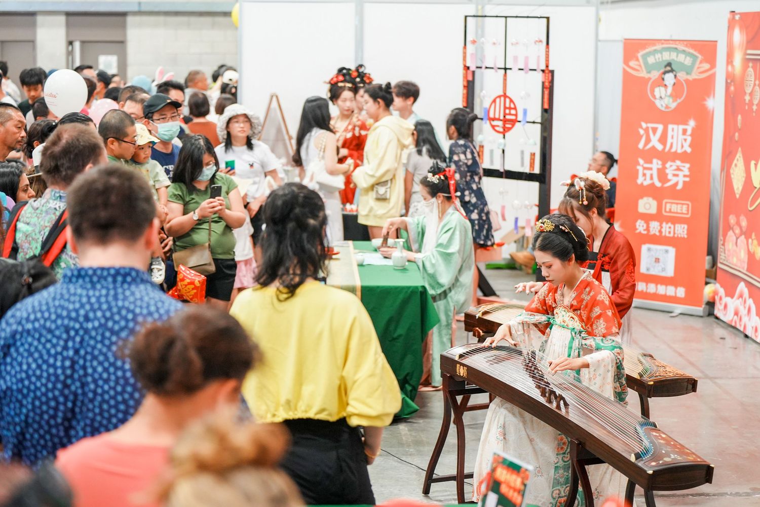 Lively New Year Hanfu market stall event photography capturing cultural portraits and interactions, by an Auckland photographer.