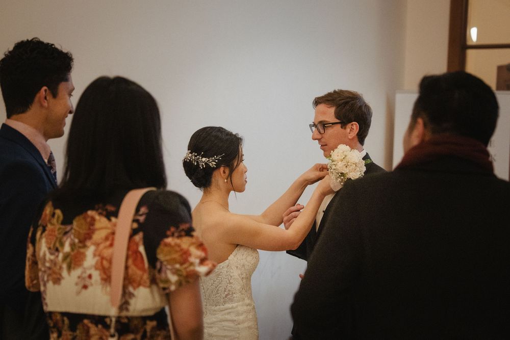 Wedding couple's candid moments captured during reception celebration.