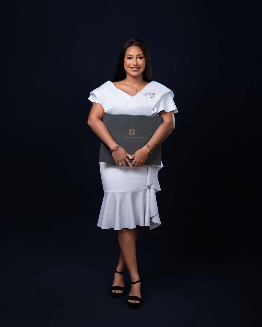 Fotografía de graduación ITSC San Luis en estudio con la familia