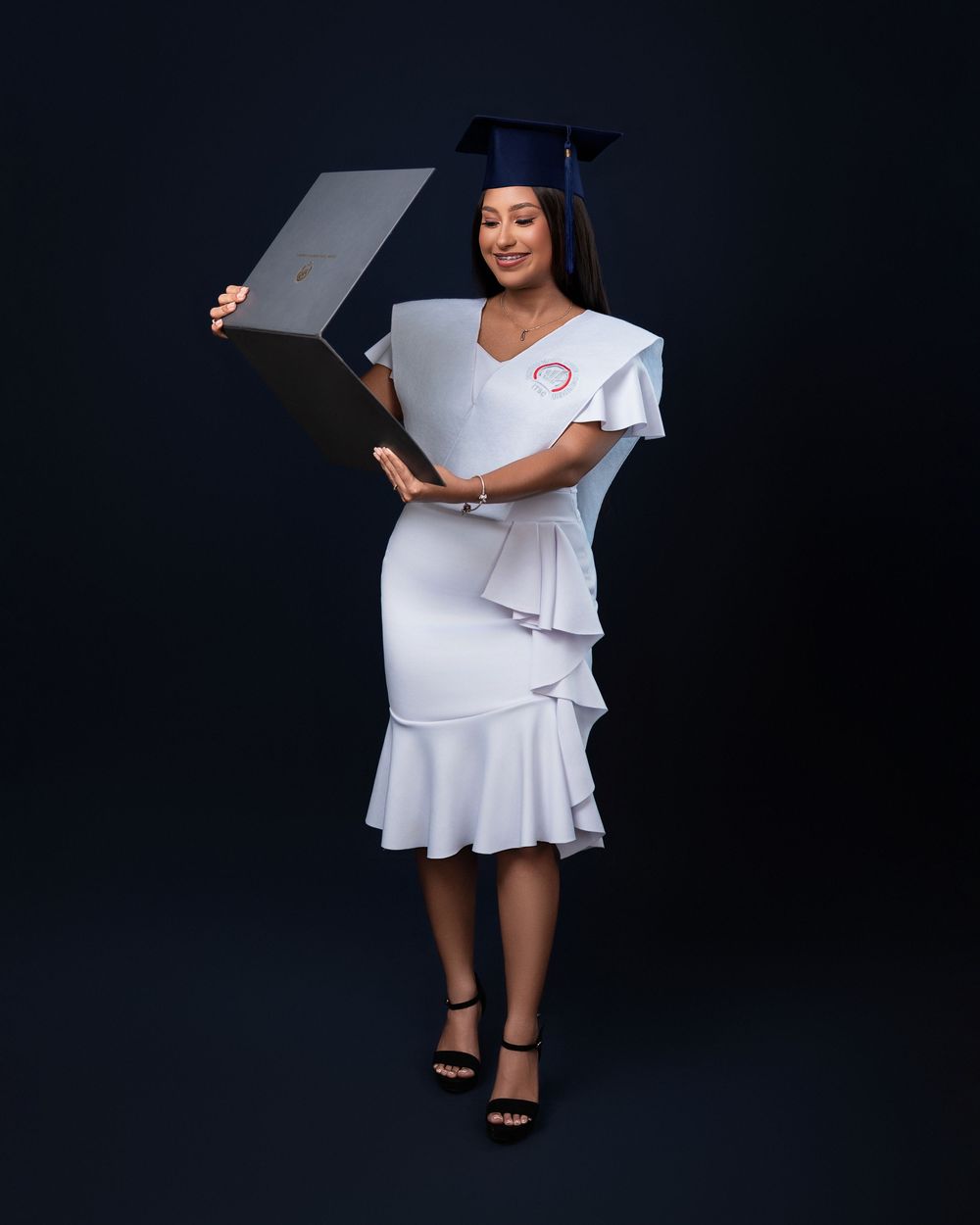 Fotografía de graduación ITSC San Luis en estudio con la familia