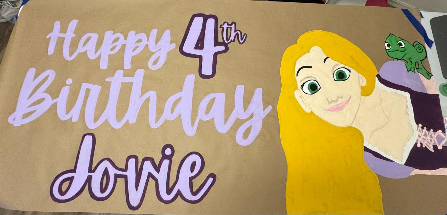 Birthday banner designed and painted by Art by Summer Judd.