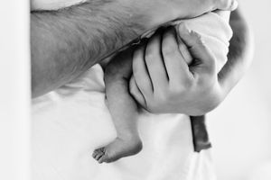 Black and white photo of delicate baby details.