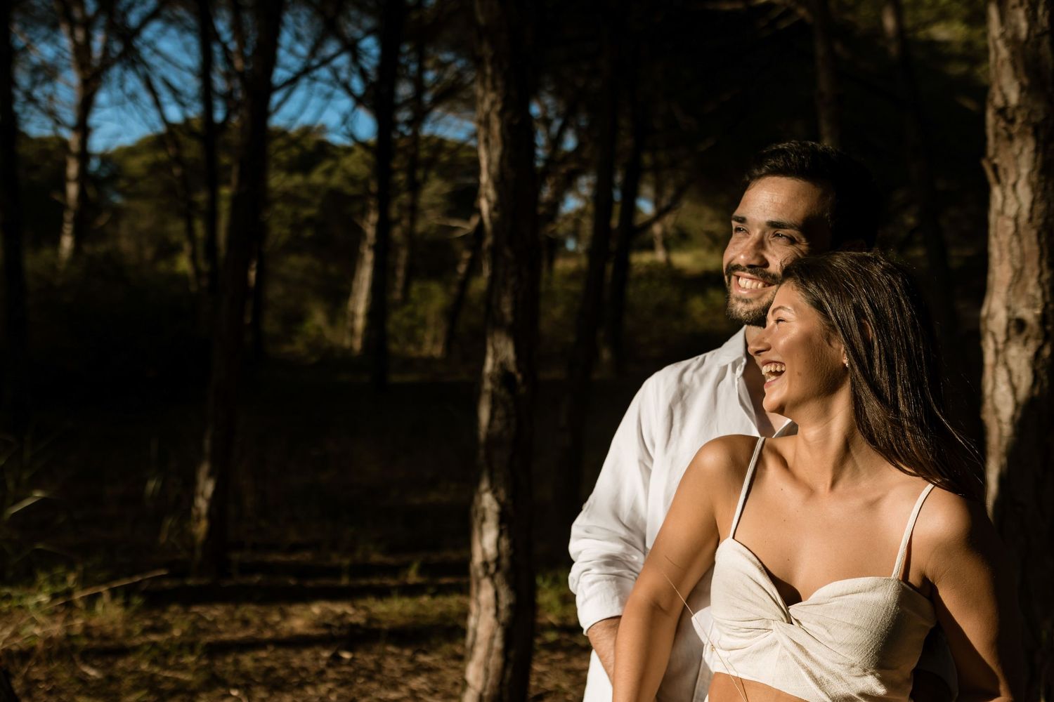 engagement photos Lisbon with couple laughing together in natural outdoor setting