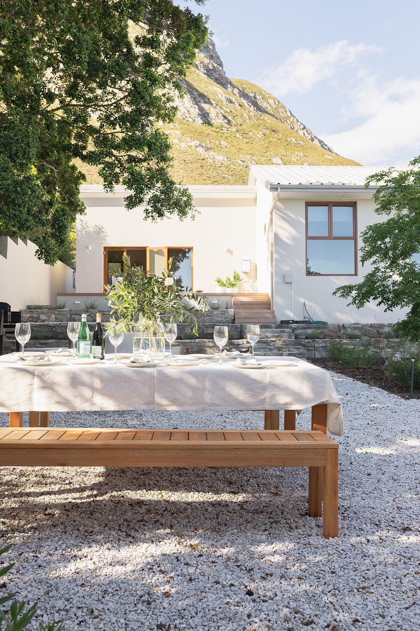 Tulani House exterior in Hermanus surrounded by mountains and greenery