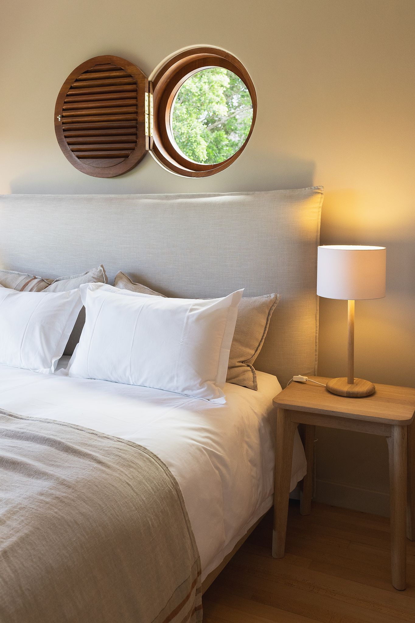 Minimalist bedroom with linen bedding and calming interior styling