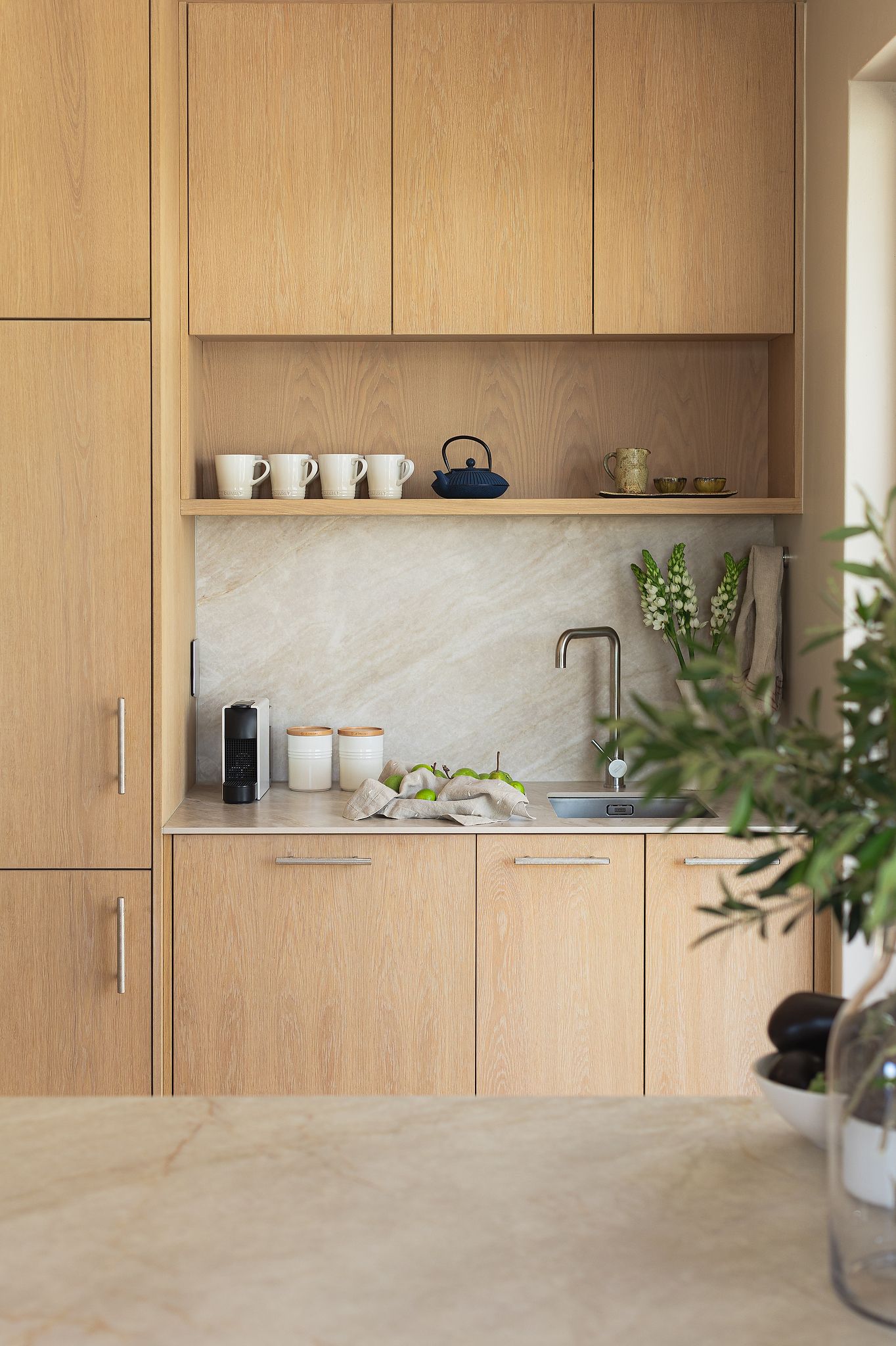 Modern kitchen with clean lines and natural finishes in Hermanus home
