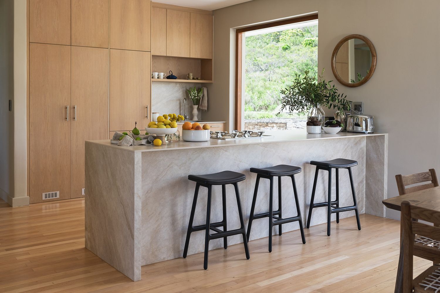 Open-plan dining space with contemporary styling and neutral palette