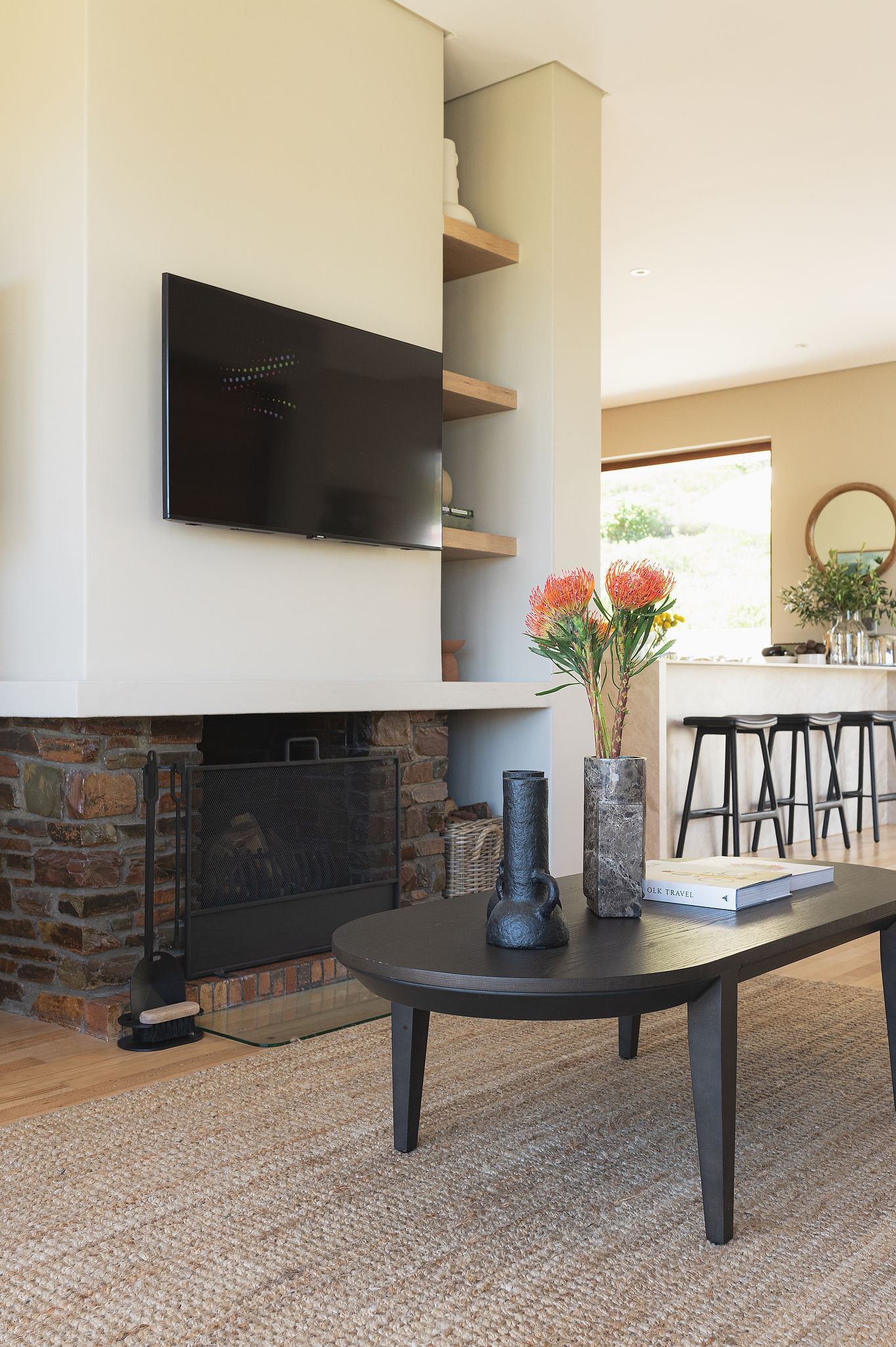 Living area with natural textures and soft lighting in luxury holiday home