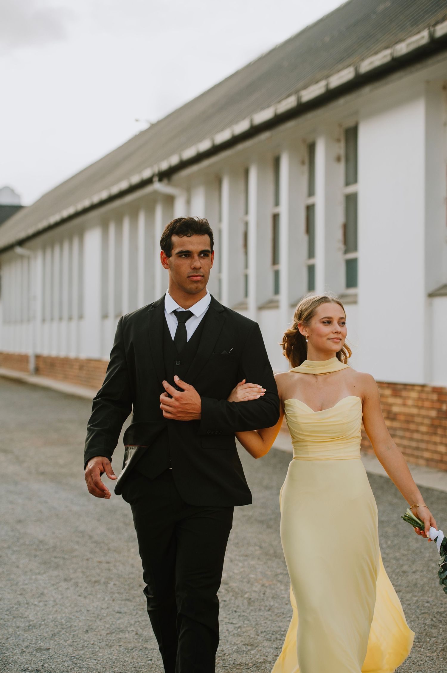 High school matric farewell couple at Oakdale Landbouskool, butter yellow dress, romantic walk”