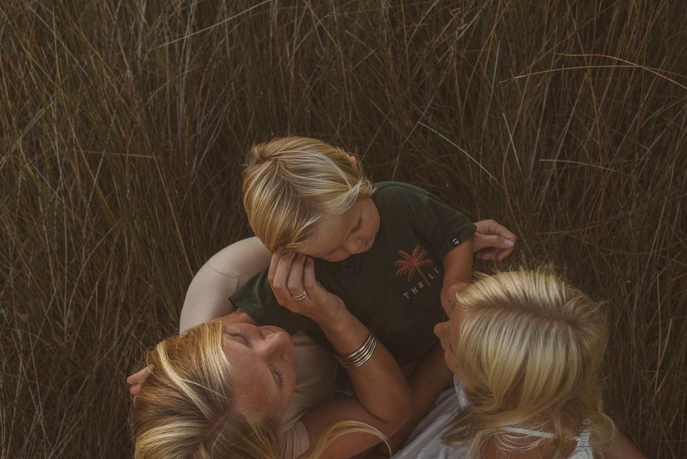 A sequence of romantic kisses between a couple shown in multiple connected photos.