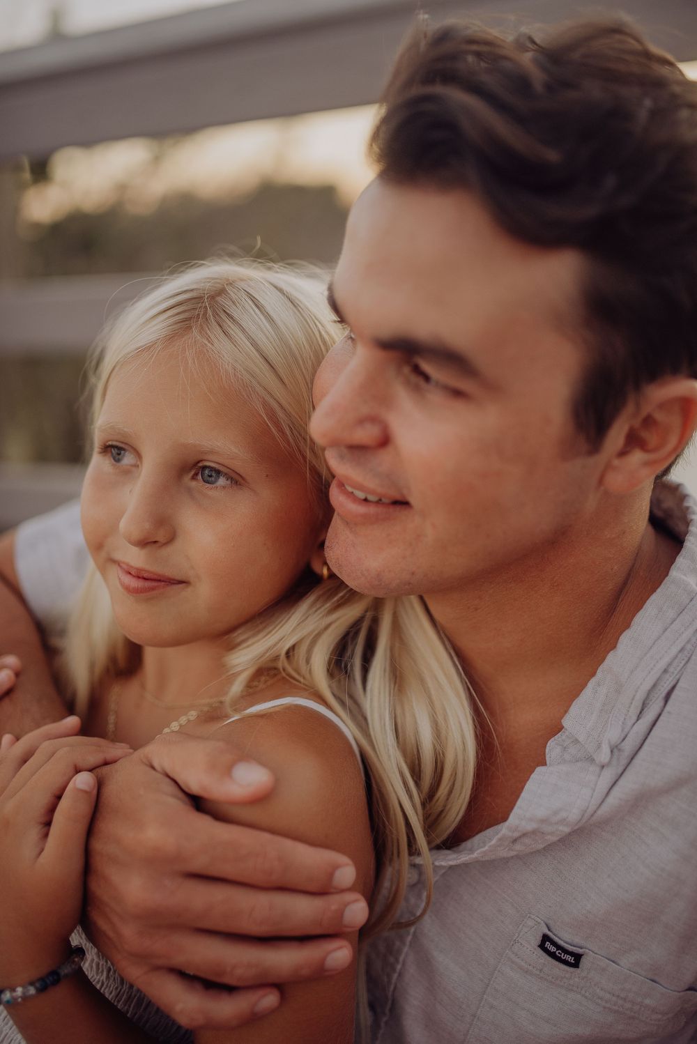 A romantic couple sharing tender moments in a series of intimate close-up photographs.