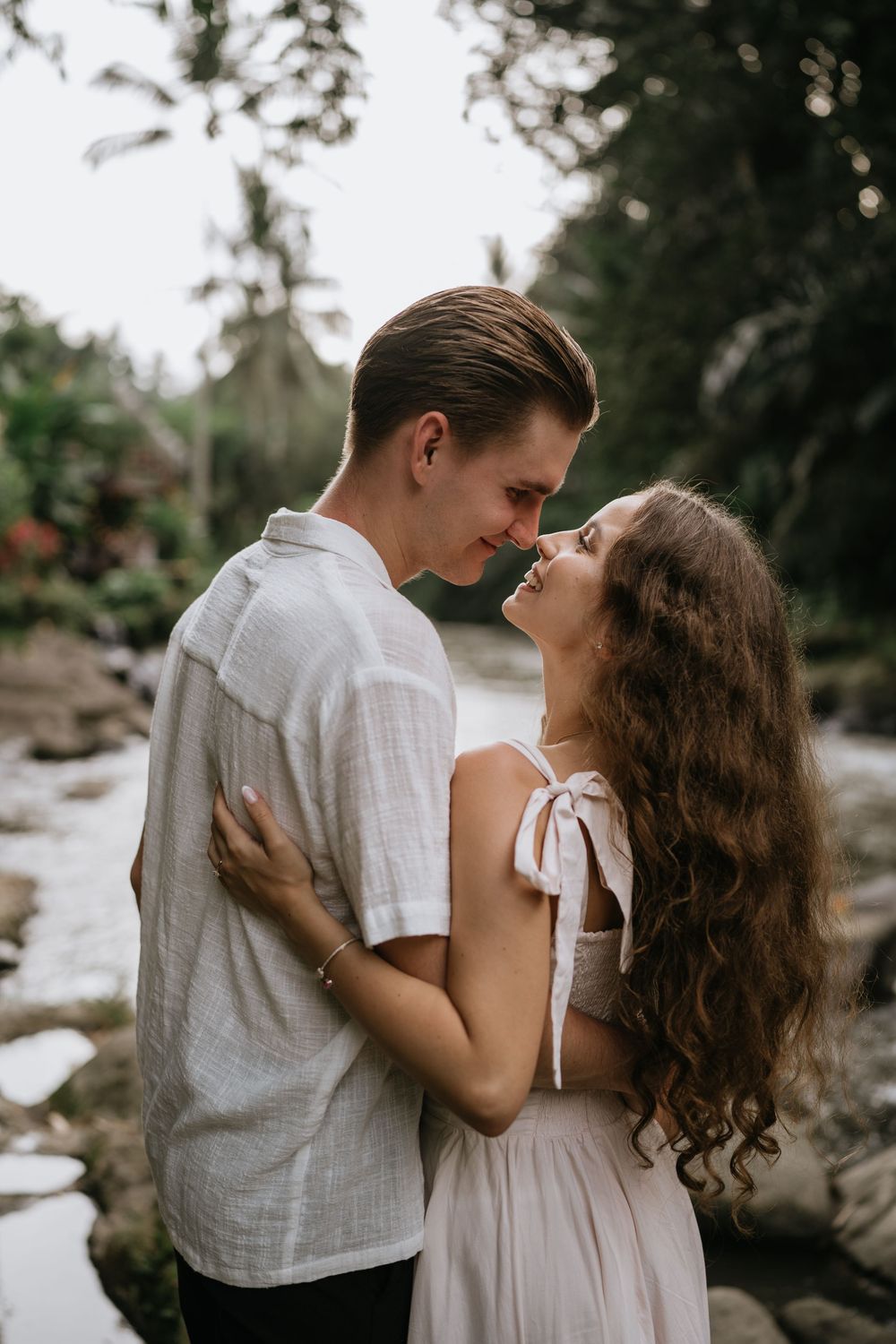 Engagement couple photoshoot at Samaya Ubud Bali surrounded by lush jungle