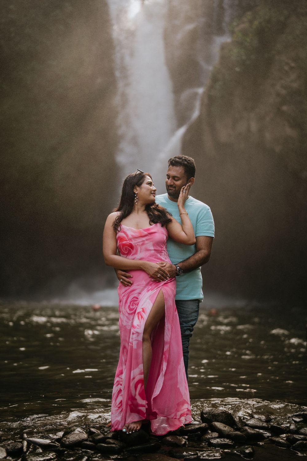 Bali couple photoshoot with Tegenungan waterfall background