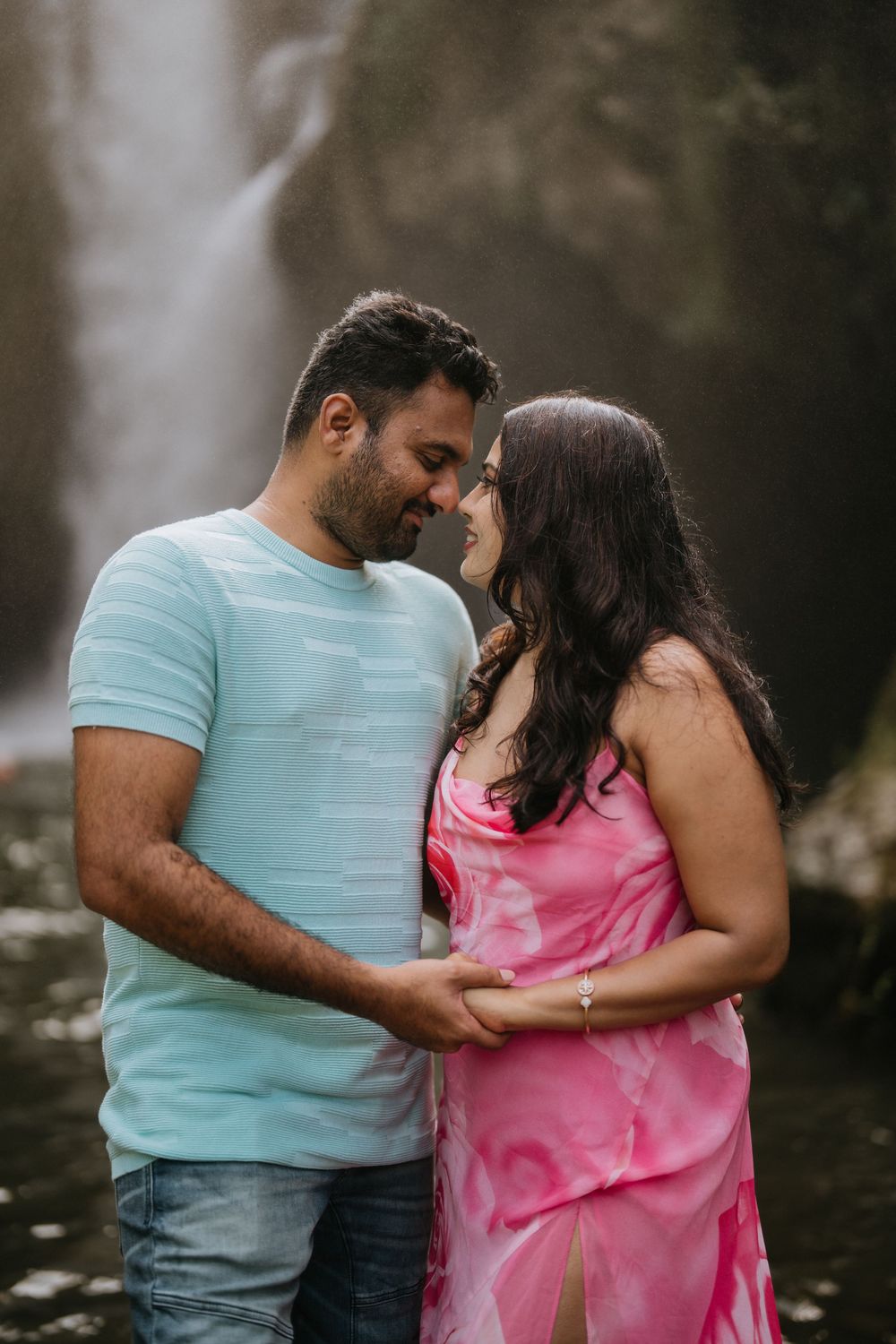 Bali couple photoshoot with Tegenungan waterfall background