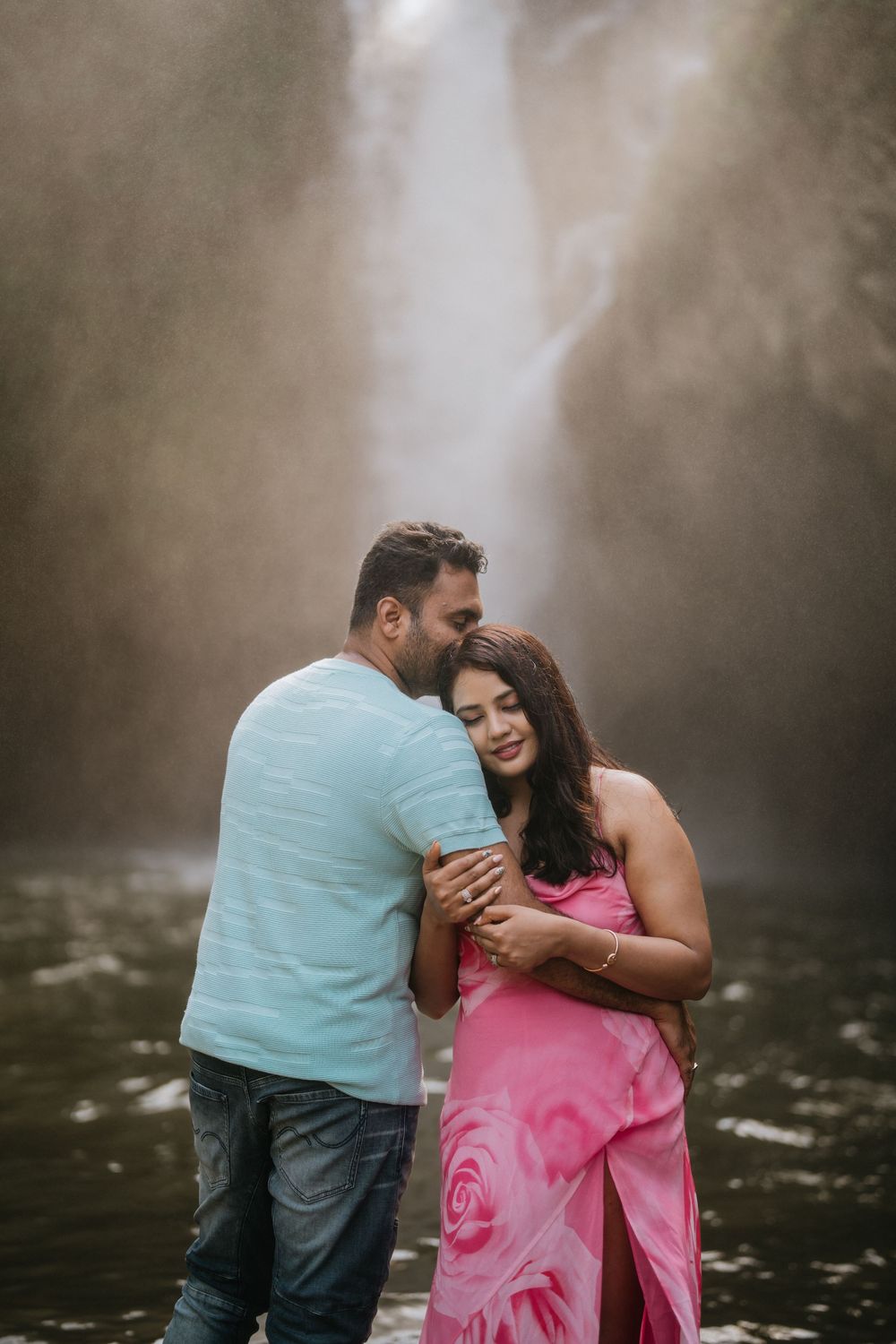Bali couple photoshoot with Tegenungan waterfall background