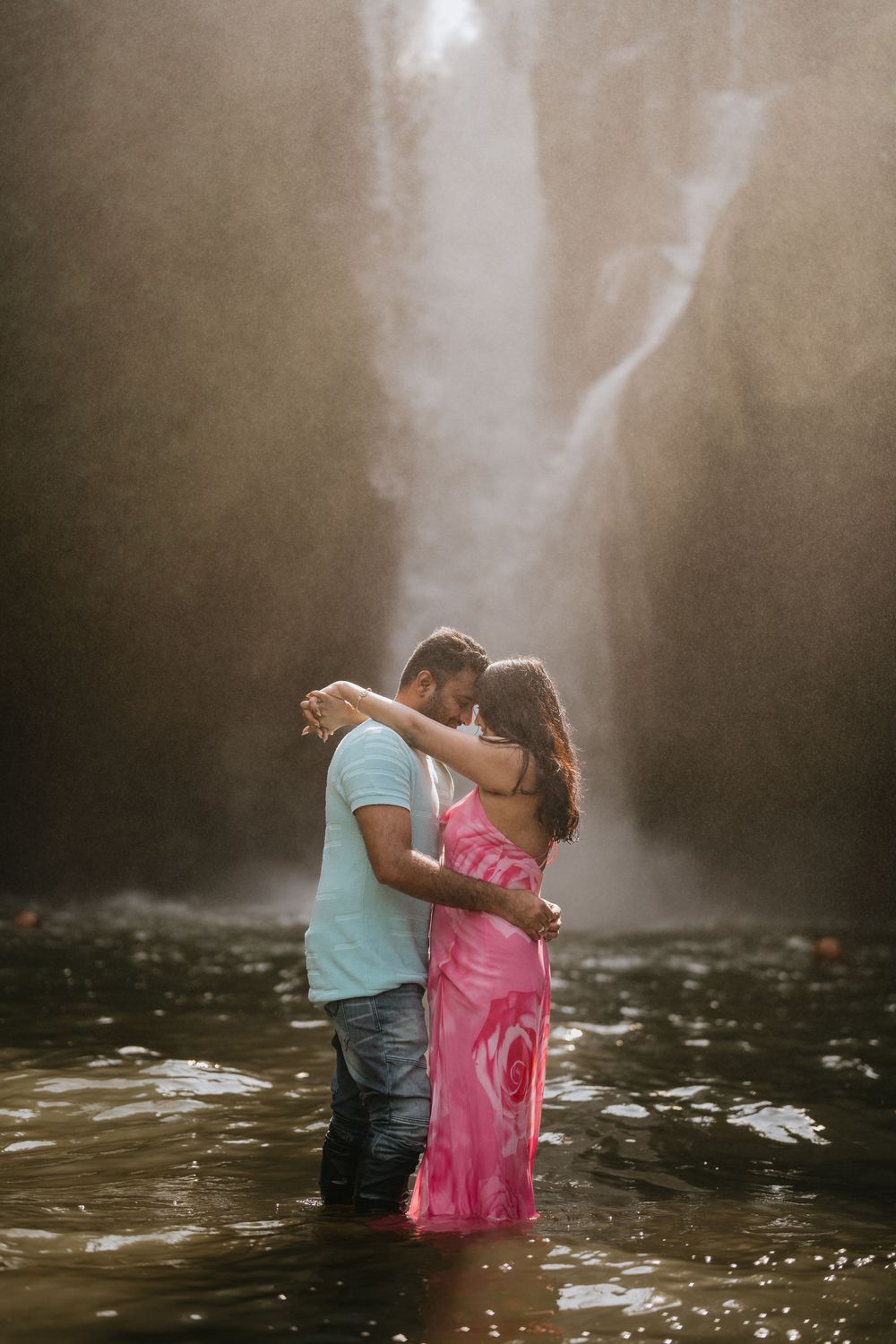 Bali couple photoshoot with Tegenungan waterfall background