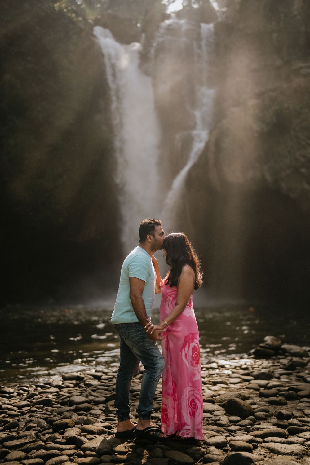 Bali couple photoshoot with Tegenungan waterfall background
