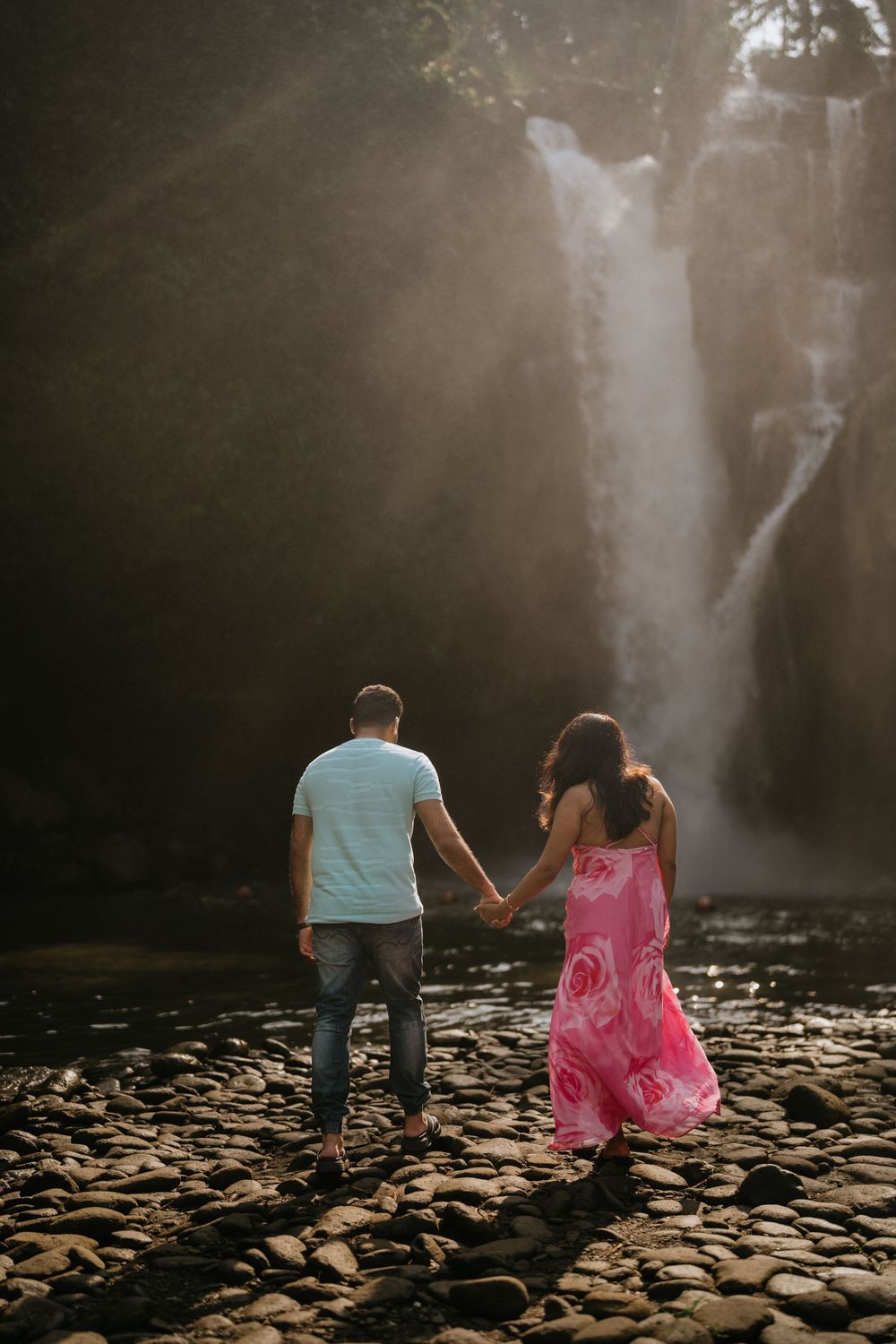 Bali couple photoshoot with Tegenungan waterfall background