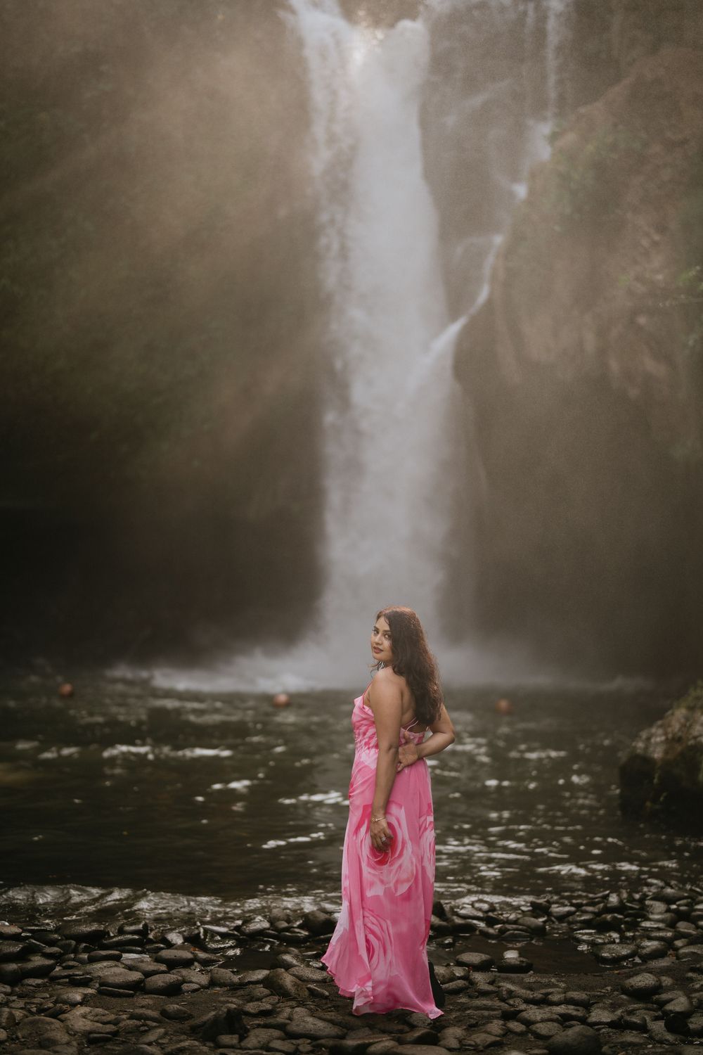 Bali couple photoshoot with Tegenungan waterfall background