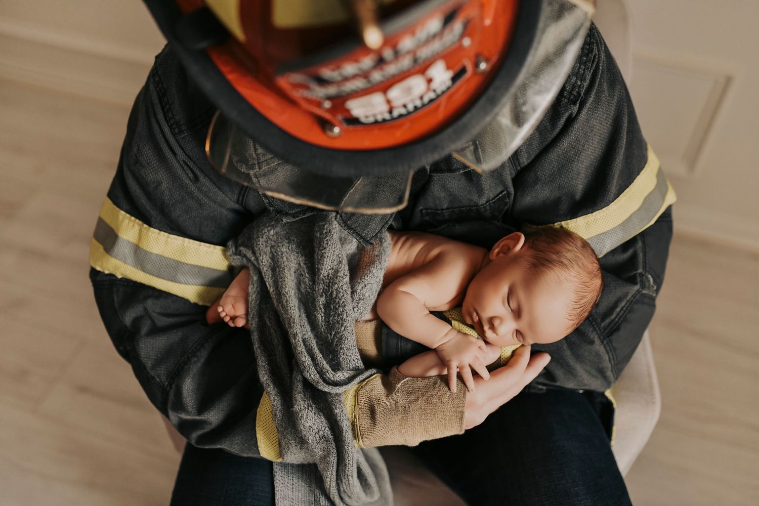 Soft, editorial-style newborn photography in Denton studio capturing connection between parents and baby