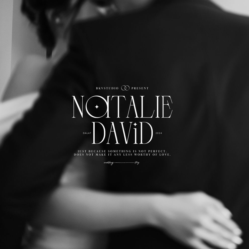 Stylish black and white wedding invitation design with modern typography.