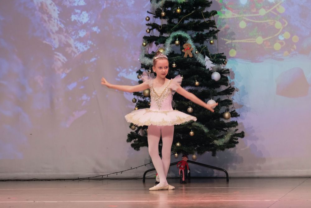 Kids stage dancing photoshoot capturing vibrant school performance in Dubai