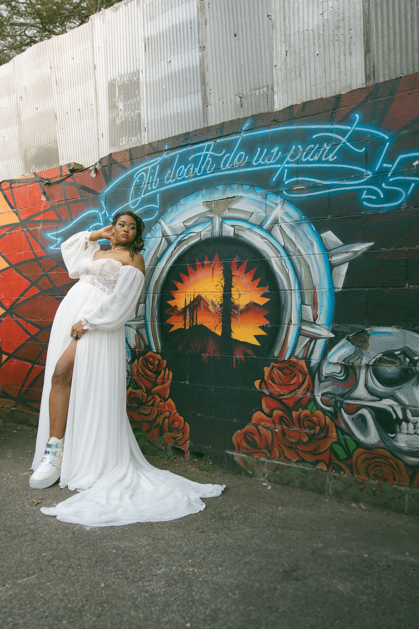 romantic queer lgbtq couple vintage dive bar mural fleetwoods asheville NC elopement wedding day brides adventure