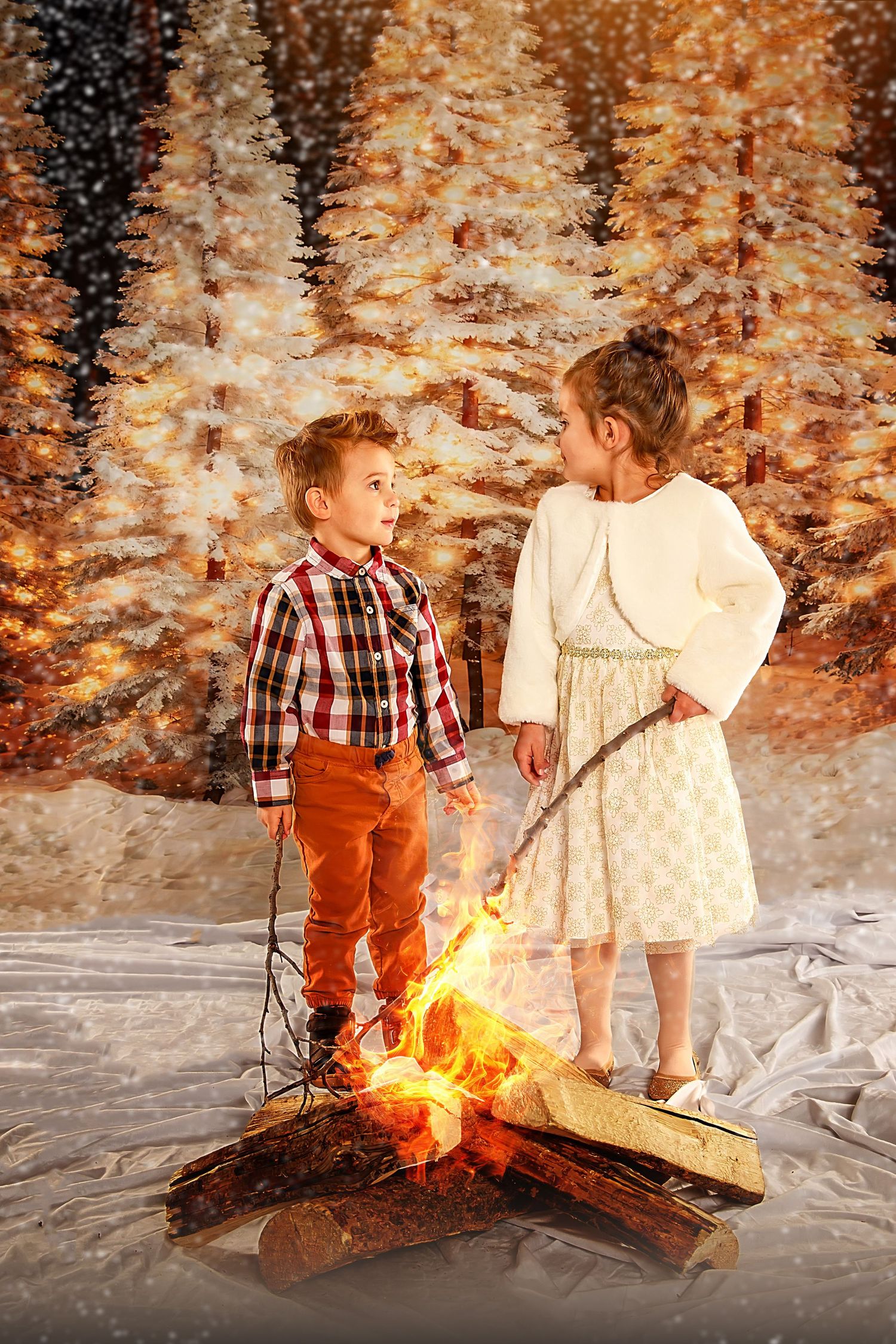 Two children standing by a campfire in a snowy winter forest setting.