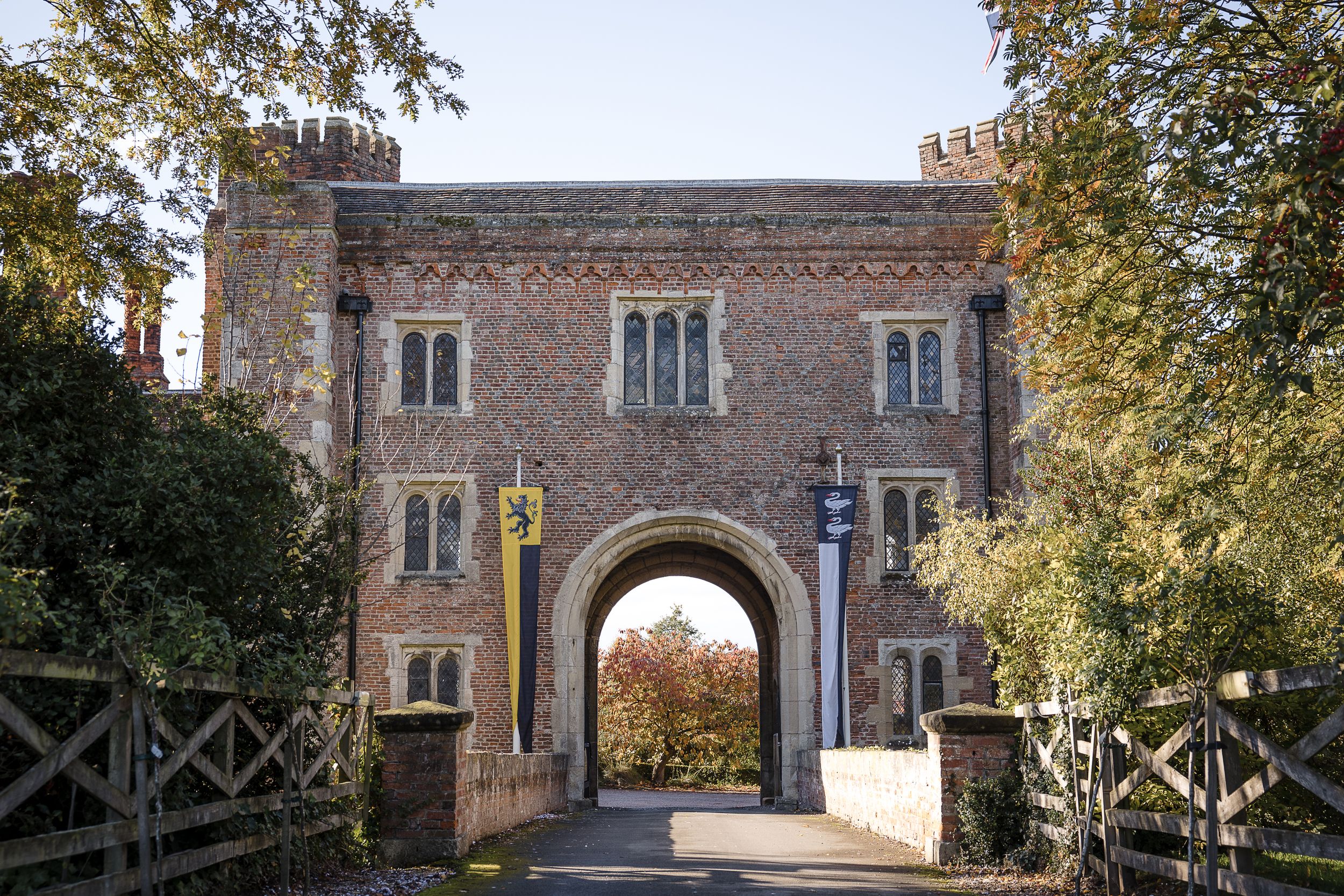 Hodsock Priory wedding photographer capture of the Gatehouse from the tree-lined driveway in Nottinghamshire