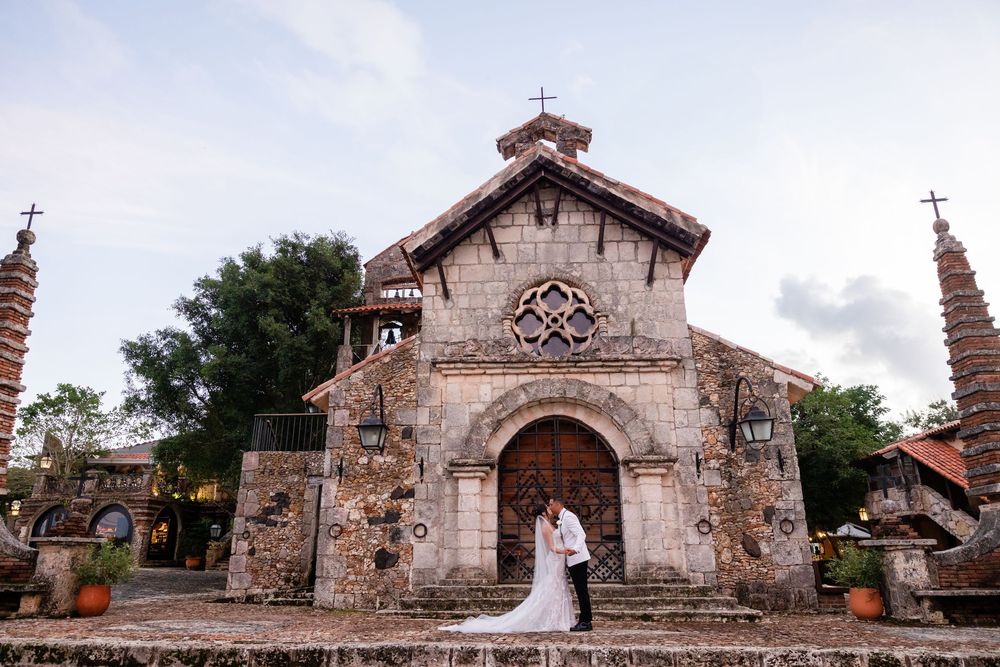 Stone chapel with ornate architectural details and arched entrance at Altos de Chavon in Dominican Republic.