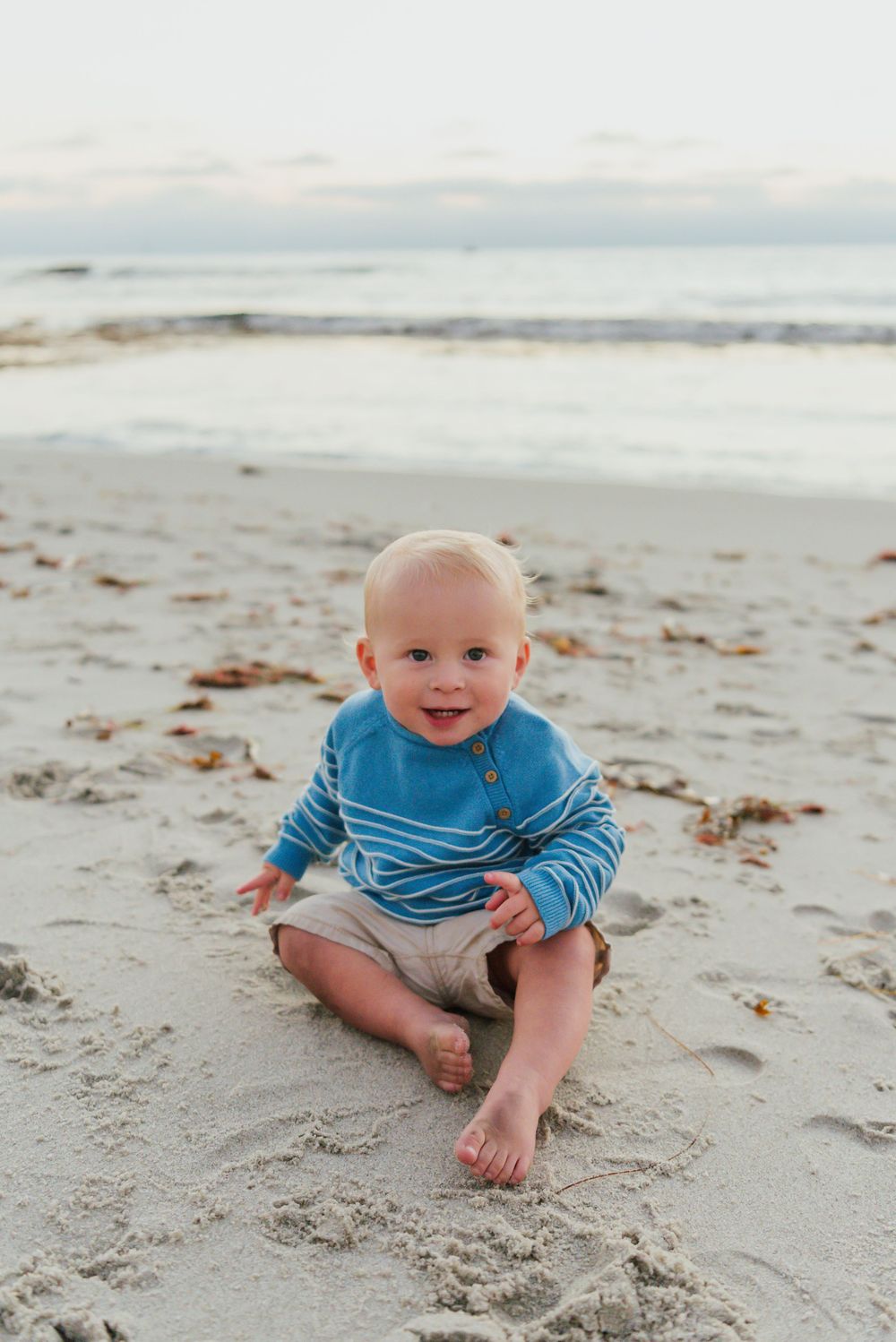 Windansea Beach family photos in San Diego with playful, candid moments by the ocean.