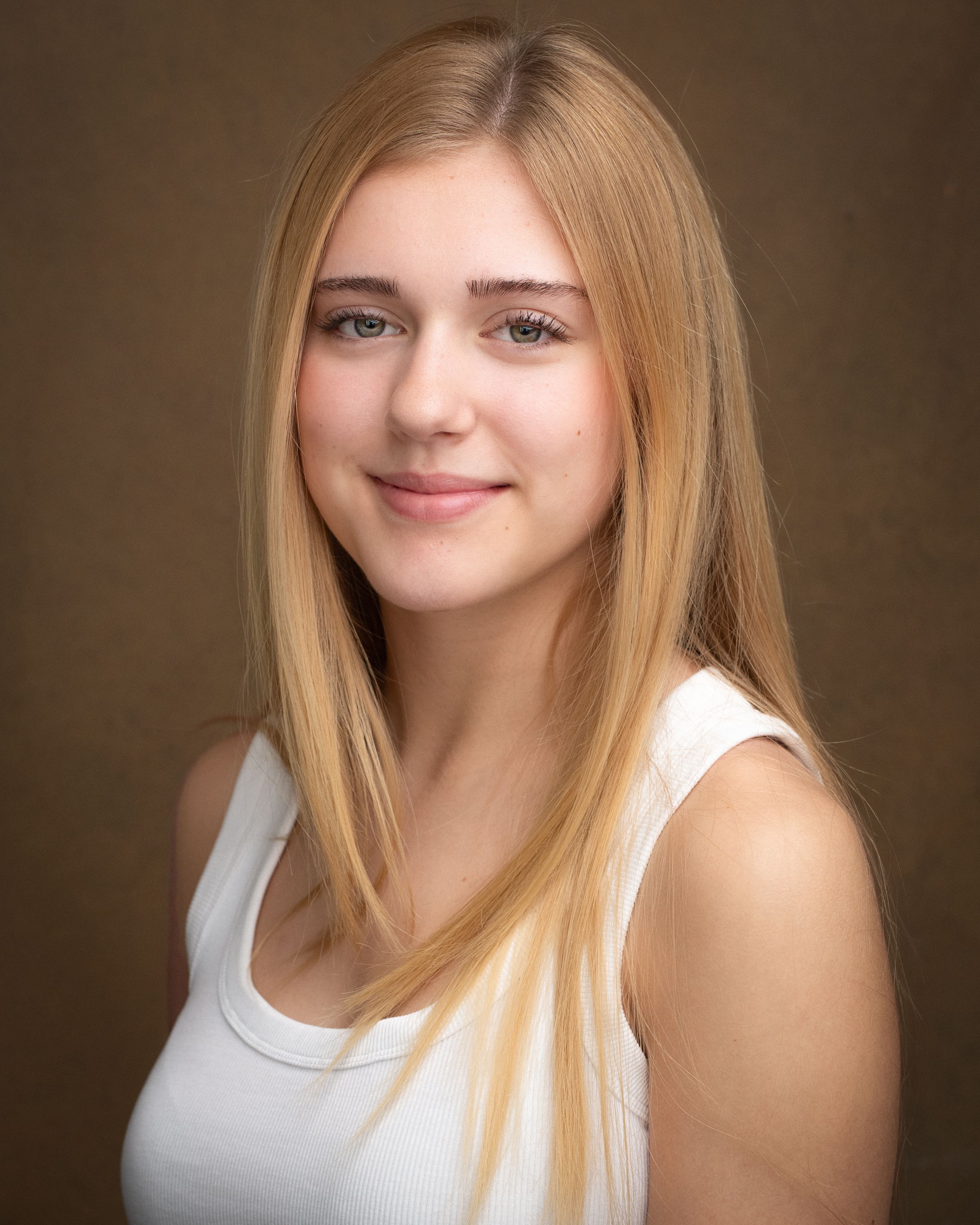 A series of portrait photos showing a person in a white tank top against a brown background with soft lighting.