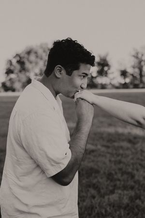 Candid black and white photo sequence in an outdoor setting.