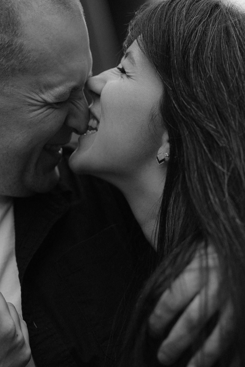 Black and white romantic close-up photo series showing couple about to kiss in intimate moments.