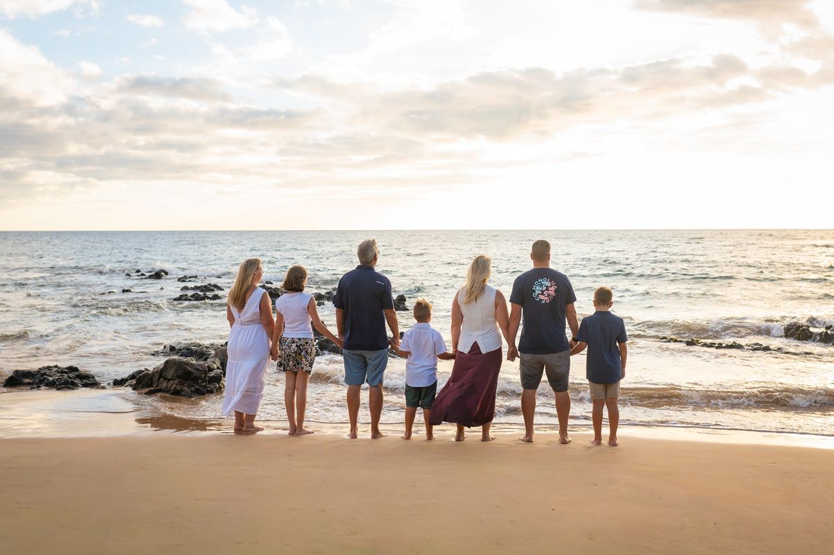 Maui family photographer photo against beautiful Maui sunset beach by ohwowfotos.