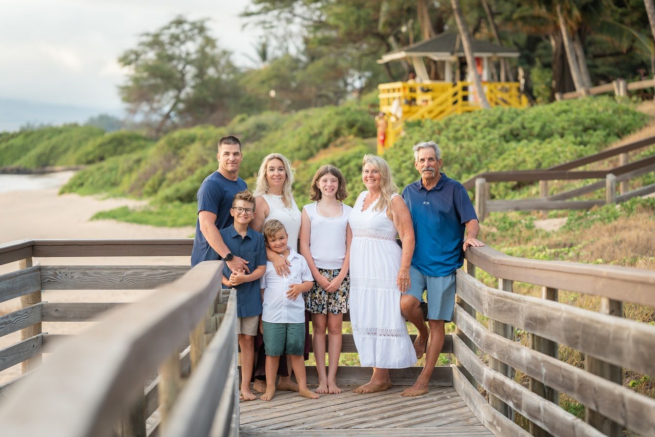 Maui family photographer photo against beautiful Maui sunset beach by ohwowfotos.