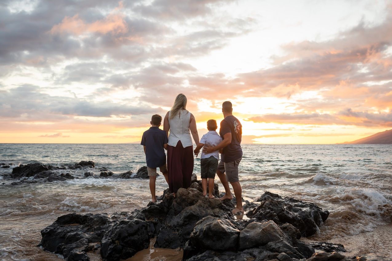 Maui family photographer photo against beautiful Maui sunset beach by ohwowfotos.