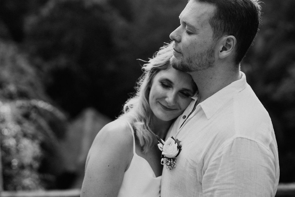 Intimate black and white wedding portraits showing tender moments.