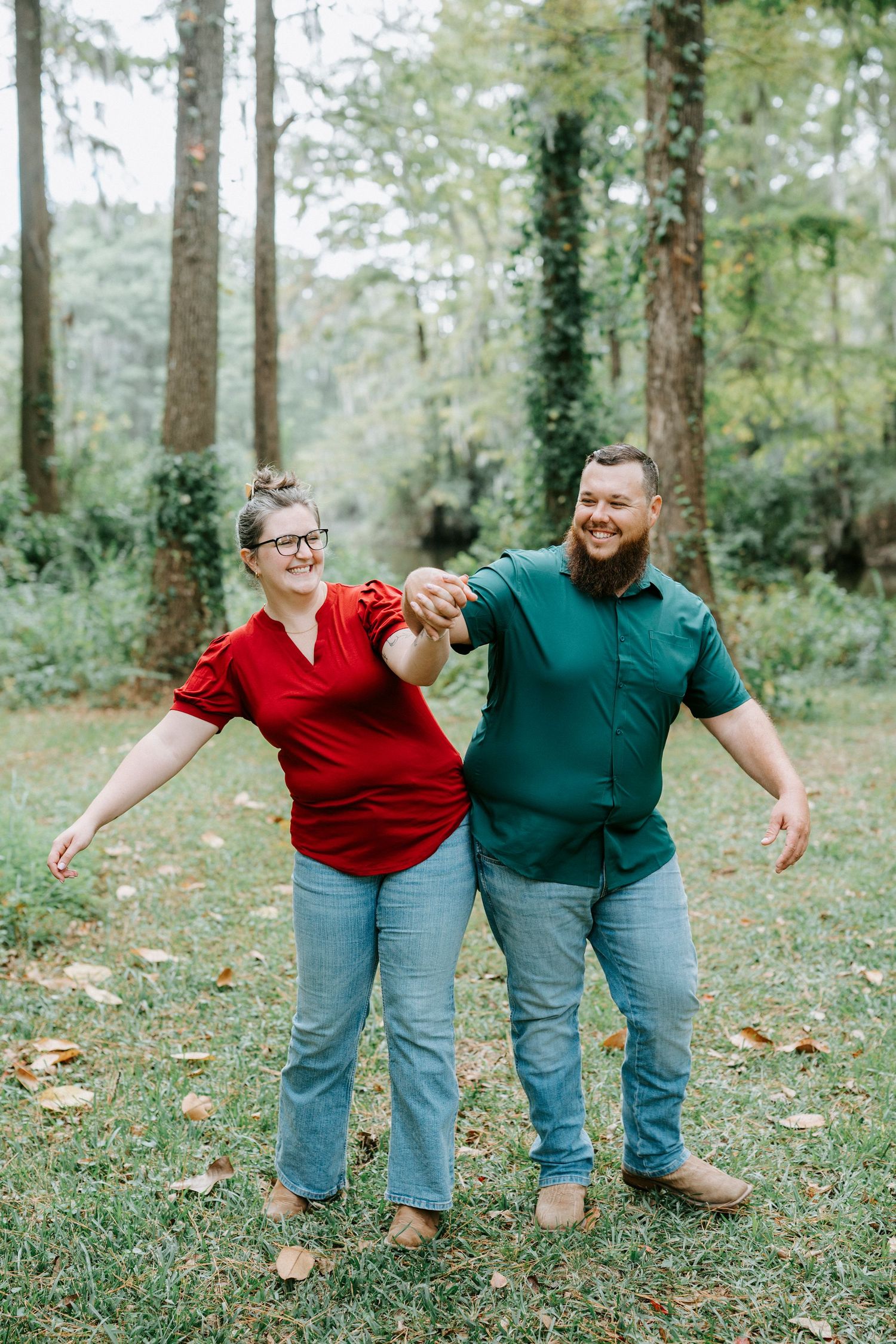 Four sequential photos show a playful couple in matching red and green tops with jeans falling sideways in an outdoor setting.