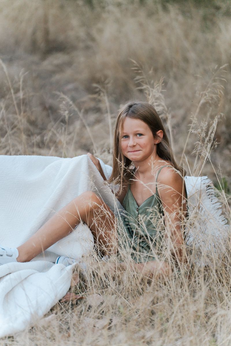 Dreamy outdoor photo session in a golden wheat field with dress and natural lighting in western sydney photoshoot in Sydney