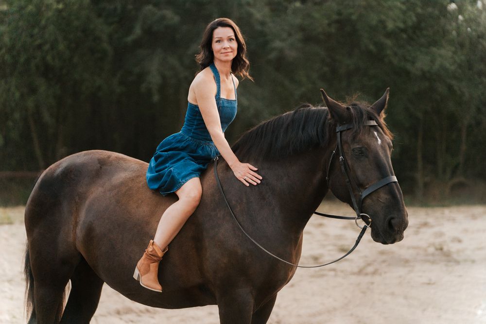 Shots showing a rider and horse standing in the afternoon light during a horse and family photoshoot in Sydney