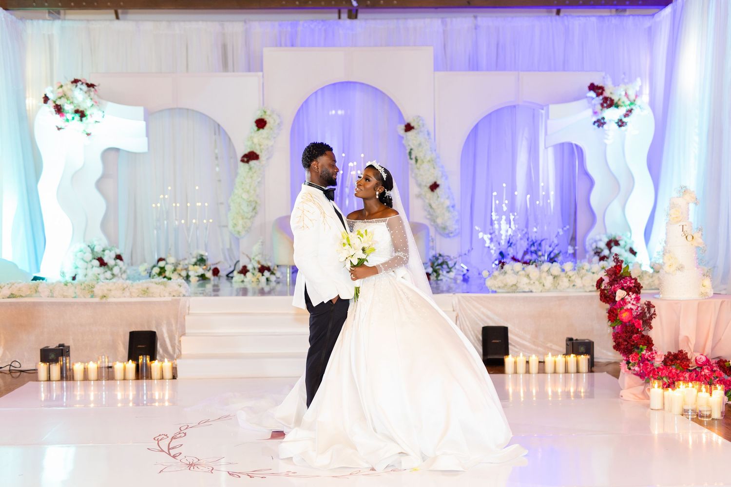 A beautiful outdoor rustic wedding ceremony is captured in a sequence of photos under a wooden pavilion in a pine forest.