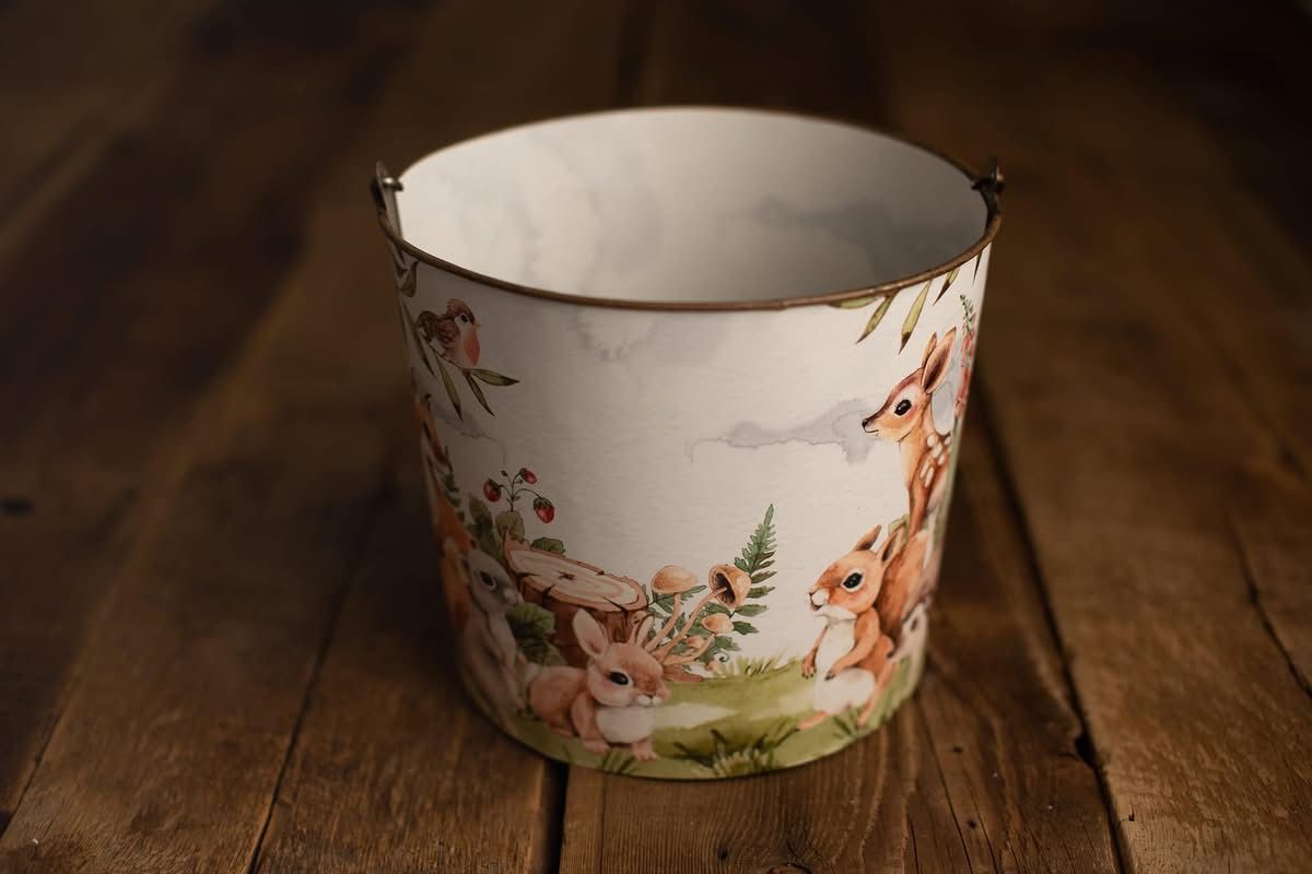 A series of watercolor woodland animals and forest scenes painted in rustic earth tones with red accents.