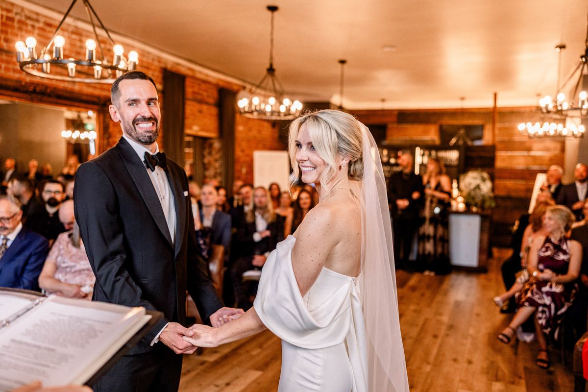 Emotional first look between bride and groom before ceremony